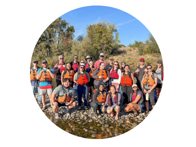 Group of students wearing life jacket at the America River